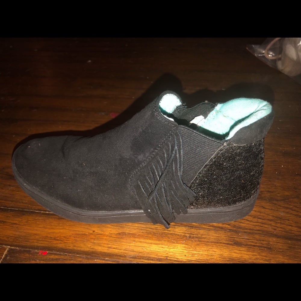 Black fringe slip on sneaker